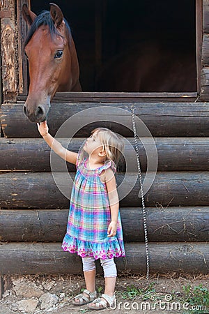 Horse and child Stock Photo