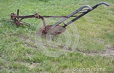 Horse drawn amish farm plow Stock Photo