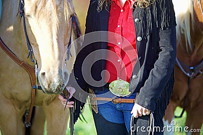 A Horse Girl With her Buckskin Stock Photo