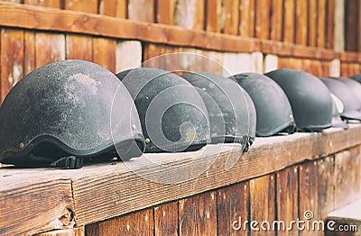 Horse helmet waiting to be used at horse riding Stock Photo