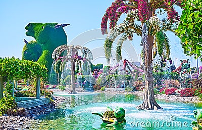 The horse installations behind the fountain, Miracle Garden, Dubai, UAE Editorial Stock Photo