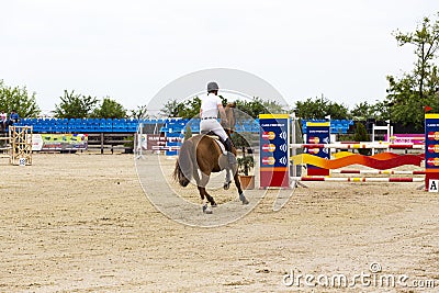 Horse jump at the equitation contest Stock Photo