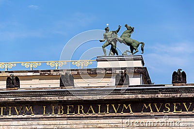 Horse with man bronze sculpture on the roof of Old Museum - Altes Museum in Berlin, Germany Stock Photo