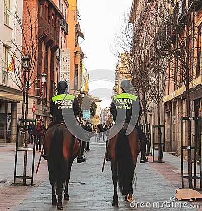 Horse police power in Madrid, Spain Editorial Stock Photo