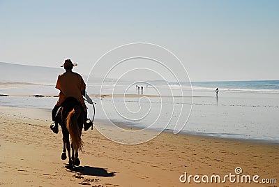 Horse ride on the beach. Taghazout. Souss-Massa-DrÃ¢a. Morocco Editorial Stock Photo