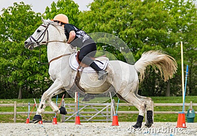 Galloping Pony with rider Editorial Stock Photo