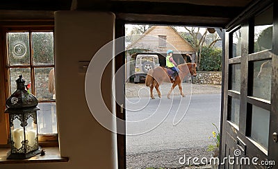 Horse rider on the road Editorial Stock Photo