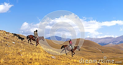 Horse riders in the steppe Editorial Stock Photo