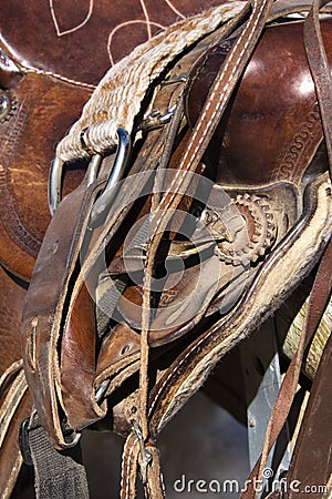 Horse Saddle on a Rail Stock Photo