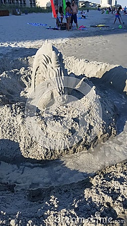 Horse sand sculpture on beach Editorial Stock Photo