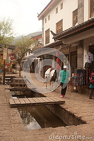 Horse walking around Shuhe ancient town. Editorial Stock Photo