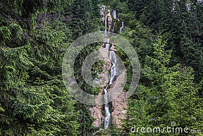 Horses Waterfall in Romania Stock Photo