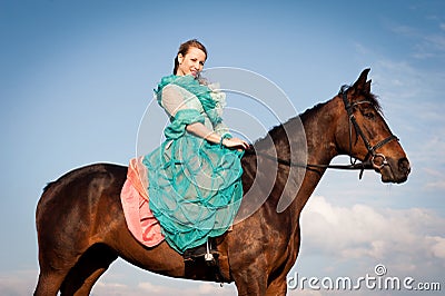 Horsewoman and blue sky Stock Photo