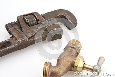 Hose bib and pipe wrench Stock Photo