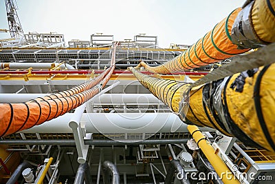 Hose line installed in oil and gas process and purge nitrogen gas into vessel for protected fire case, Offshore construction Stock Photo