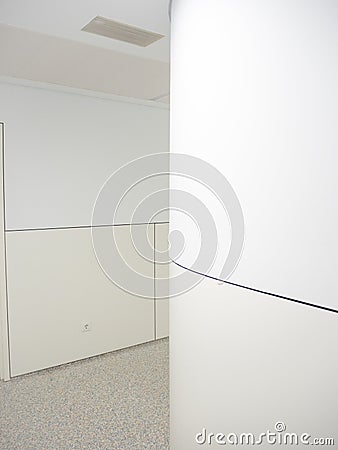 Hospital hallway with white and cream walls Stock Photo