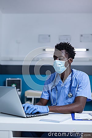 Hospital medical nurse looking for patient illness records and treatment documents Stock Photo