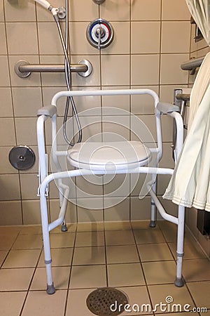 Hospital shower stall with bedside commode Stock Photo