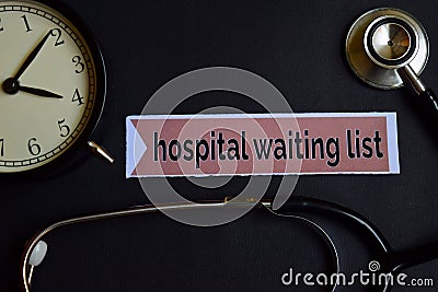 Hospital waiting list on the print paper with Healthcare Concept Inspiration. alarm clock, Black stethoscope. Stock Photo