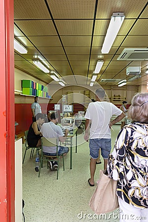 HOSPITALET DE LLOBREGAT,Barcelona,Spain July 23th,2023: Person at the polling station waiting to exercise their right to vote Editorial Stock Photo