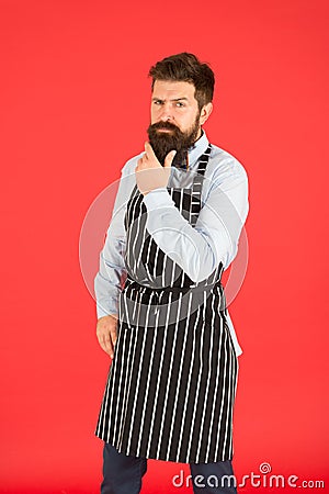Hospitality staff must be versatile and able work in all areas. Mature waiter. Waiting for the first customer. Man Stock Photo