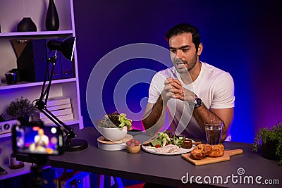 Host channel presenting fresh vegetables in special dish. Surmise. Stock Photo