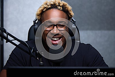 Funny black blogger entertains audience live Stock Photo