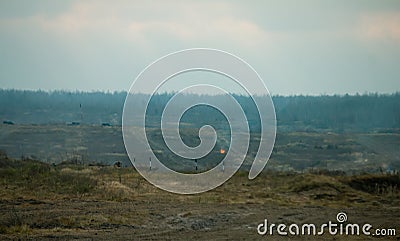 Hostilities. War concept. Military training ground with the explosions Stock Photo