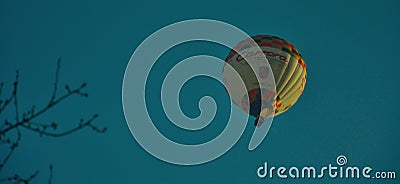 hot air balloon drifting in the wind Editorial Stock Photo