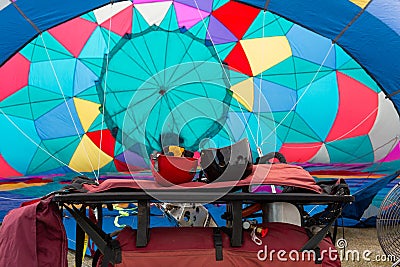 The hot air balloon is filling and all the equipment is laid out and ready to go Stock Photo