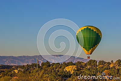 Hot Air Balloon At Low Altitude Stock Photo