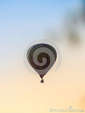 Hot Air Balloon Ride at sunset background. Sunset hot-air balloon flight with beautiful sky Stock Photo