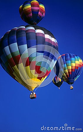 Hot air balloons agaisnt blue sky Stock Photo