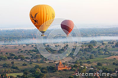 Hot air balloons flying over plain of Bagan, Myanmar Editorial Stock Photo