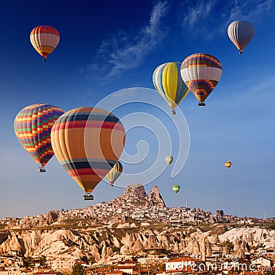 Hot air balloons near Uchisar castle Stock Photo