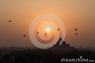 Hot air balloons at sunrise at Bagan temple in Burma Myanmar Stock Photo