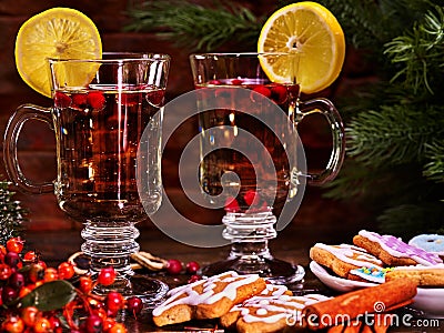 Hot alcohol wine and Christmas cookie with canella stick Stock Photo