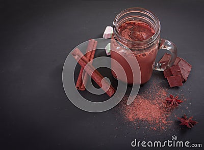 Hot chocolate in grass with marshmallows Stock Photo