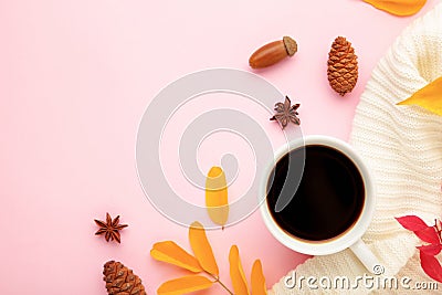 Hot coffee and autumn leaves on pink - seasonal relax concept Stock Photo