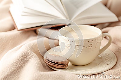 Hot coffee and book on wool background - seasonal relax concept Stock Photo