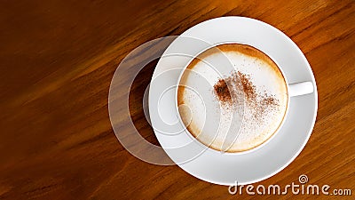 Hot coffee cappuccino latte top view on wooden table background Stock Photo