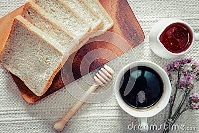 Hot Coffee Cup With Bread Baked for Breakfast, Fresh Bread With Coffee Espresso on Table Cafe Shop. Homemade Freshness Baked Whole Stock Photo