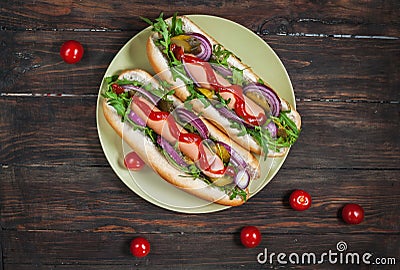 Hot dog. Grilled hot dogs with ketchup on a wooden table. Stock Photo