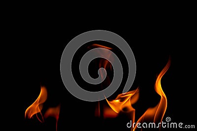 Hot flames on a black background. Beautiful flame of fire in the dark. Abstract of burning flames and smoke Stock Photo