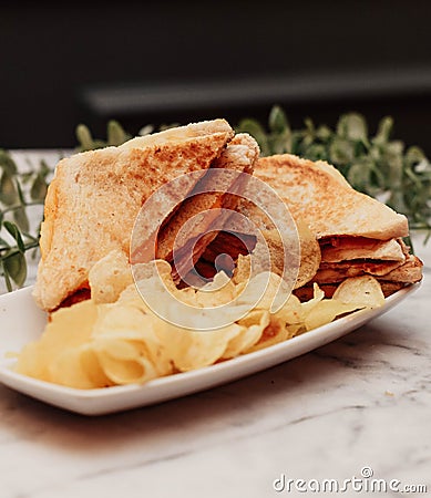 Hot ham and cheese sandwich, toasted with butter on bread Stock Photo