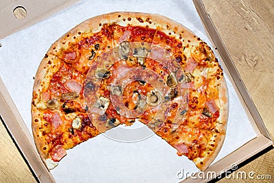 Hot italian pizza in cardboard box Stock Photo