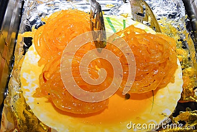 Hot jalebi placed in a plate Stock Photo