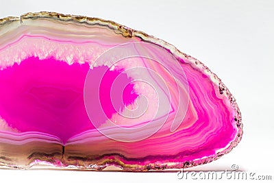 Hot pink and semi-transparent agate geode slice crystal Stock Photo