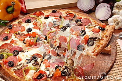 Hot tasty pizza with salami, close up Stock Photo