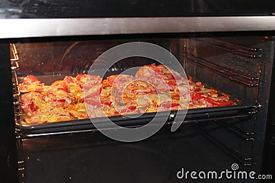 Hot sandwiches cooking in the kitchen range Stock Photo